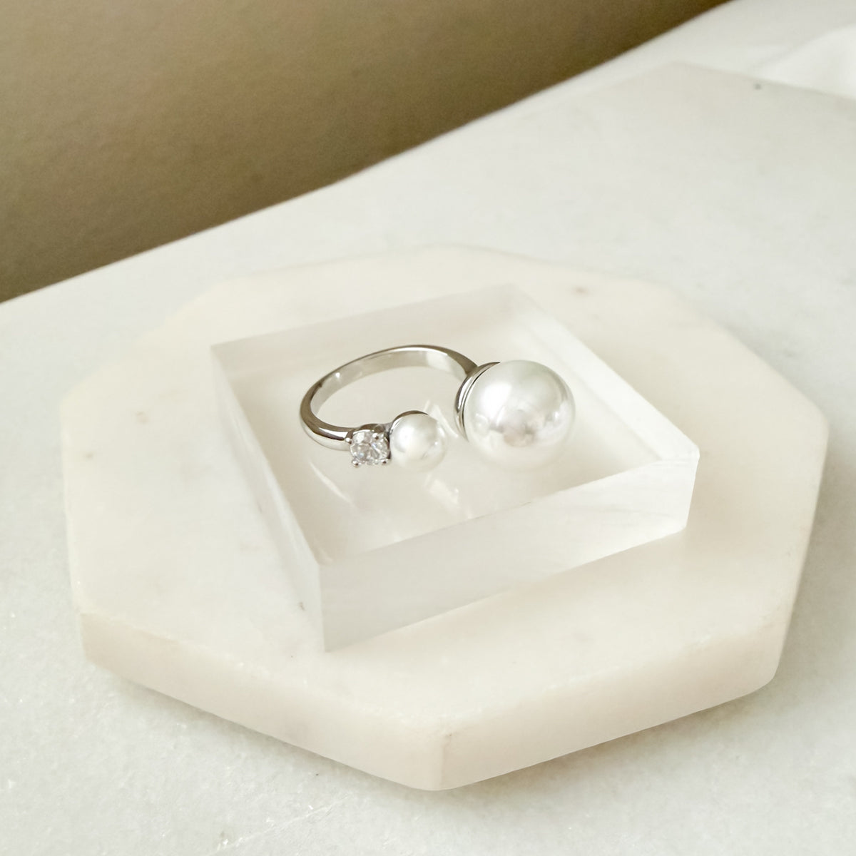 Silver ring with pearls on a hexagonal white stone Arista Open Pearl Ring - stainless steel - The Songbird Collection