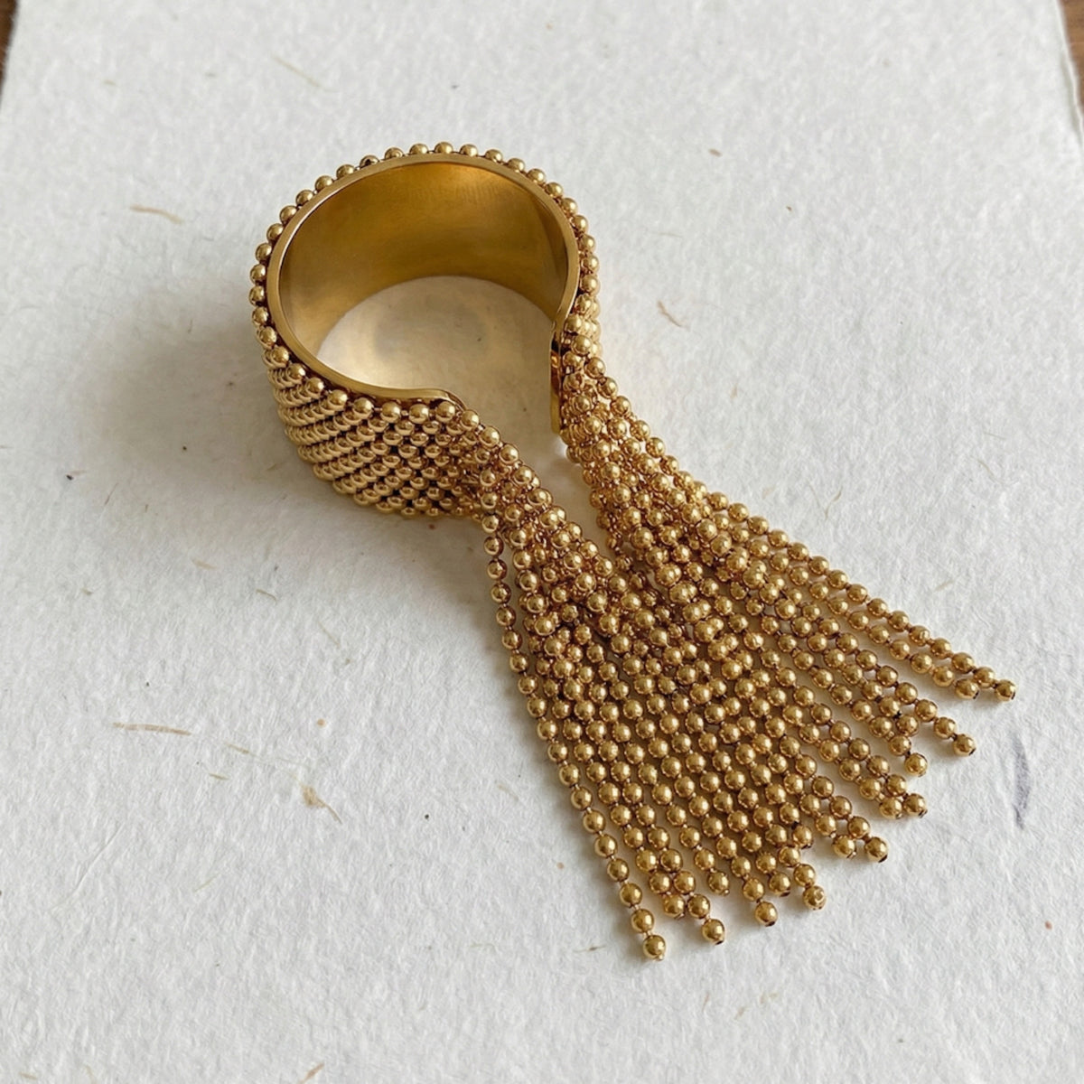 Gold beaded ring with tassels on a white background Beaded Fringe Statement Ring - The Songbird Collection
