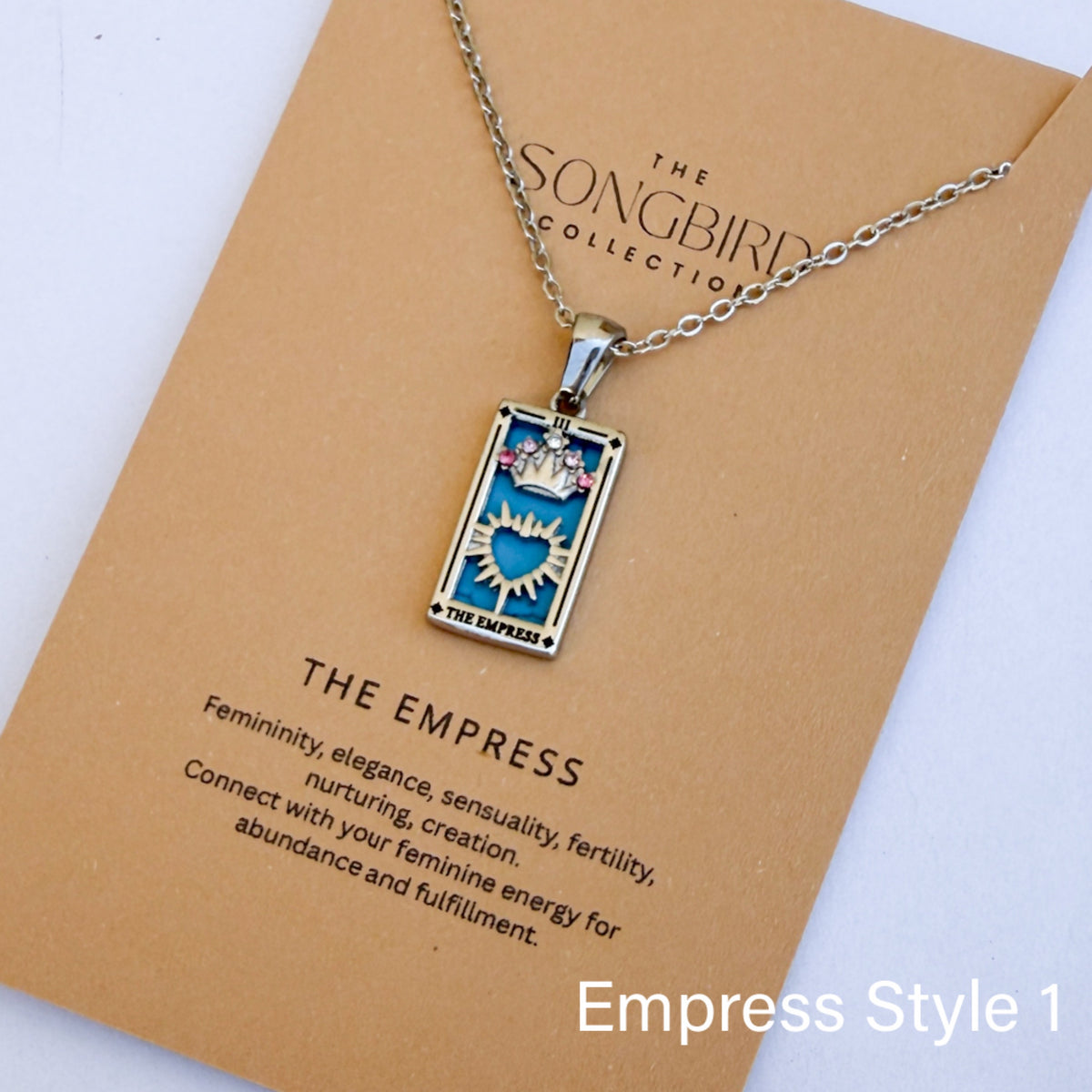 Necklace with tarot card pendant on a 'The Songbird Collection' card