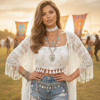Woman in a white lace choker and lace top and denim shorts with accessories at a festival.