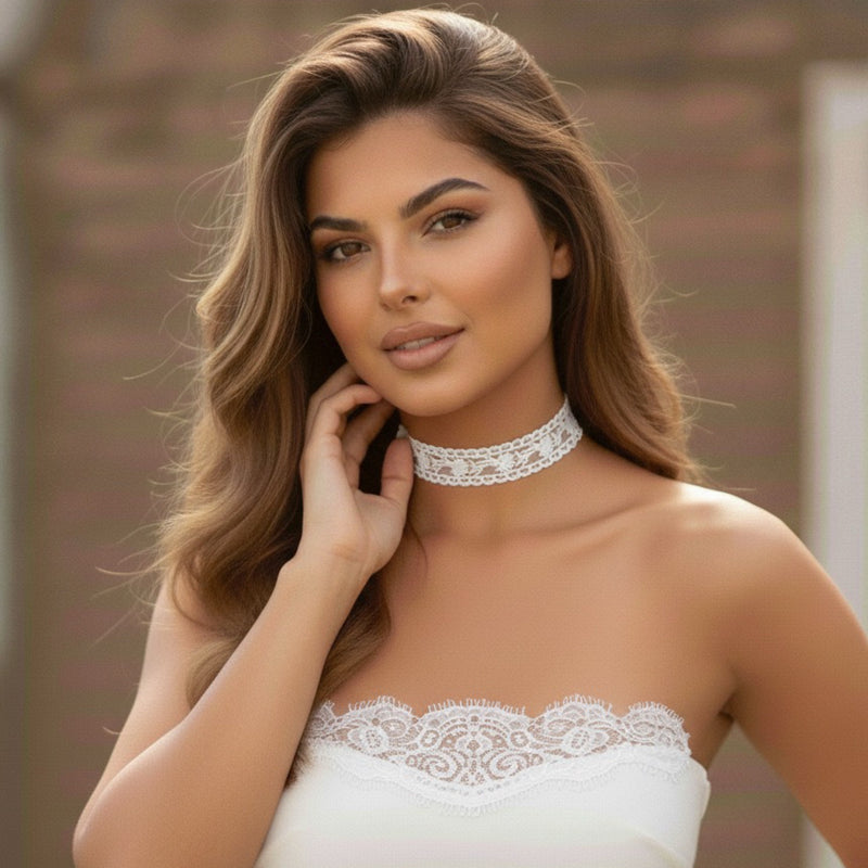 Woman wearing a white lace choker and  dress with a blurred background