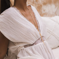 Y shaped necklace gold knotted tied