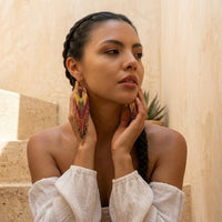 Woman wearing colorful earrings in an outdoor setting - Mojave Ombre Beaded Statement Earrings