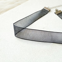 Black mesh ribbon on a white background