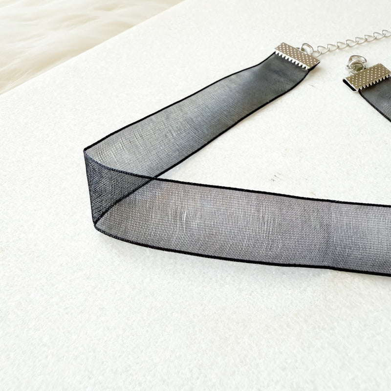 Black mesh ribbon on a white background