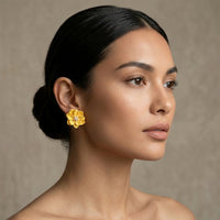 Woman wearing yellow floral earrings against a neutral background.Rosalie Earrings - The Songbird Collection