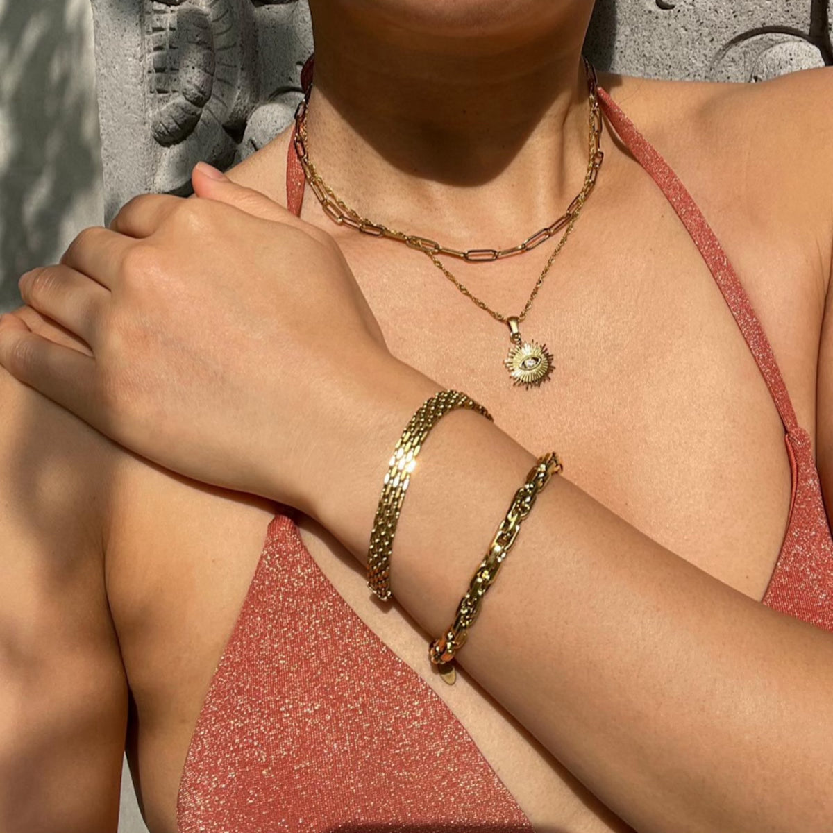 Roshanee eye sun ray necklace stainless steel gold plating the songbird collection