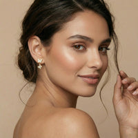 Woman wearing butterfly earrings against a beige background Sweet Butterfly Earrings - The Songbird Collection