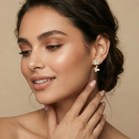 Woman wearing butterfly earrings on a beige background Sweet Butterfly Earrings - The Songbird Collection