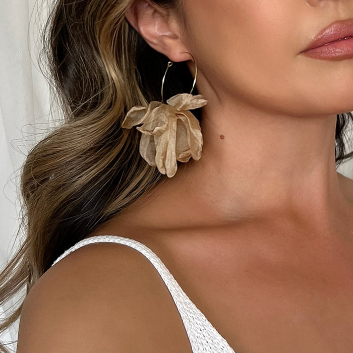 golden hoop earrings with chiffon bows resembling floral petals 